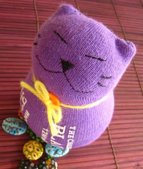 Foto: http://www.craftpassion.com/2010/09/sewing-sock-kitty-tutorial-guest-tutor.html/2
